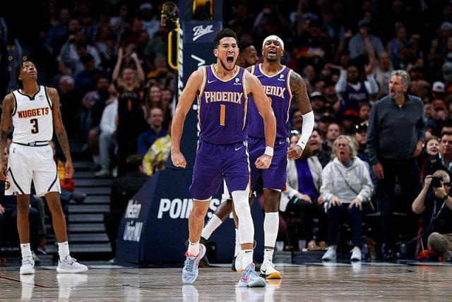 1648207616812079612.jpeg devin-booker-scores-49-at-nuggets-as-suns-clinch-top-seed-1648193791078.jpeg